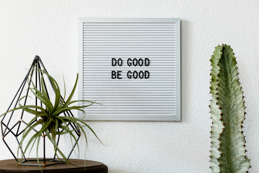 A white board reads: "Do Good, Be Good."